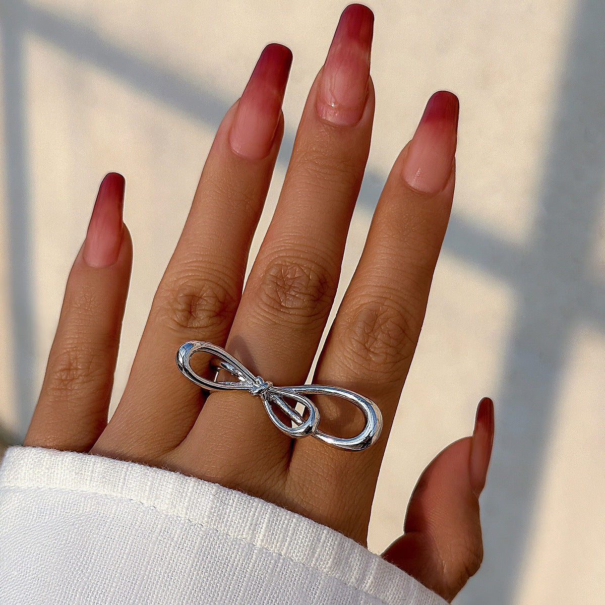 Metallic smooth butterfly ring for women, simple and exaggerated French bow ring
