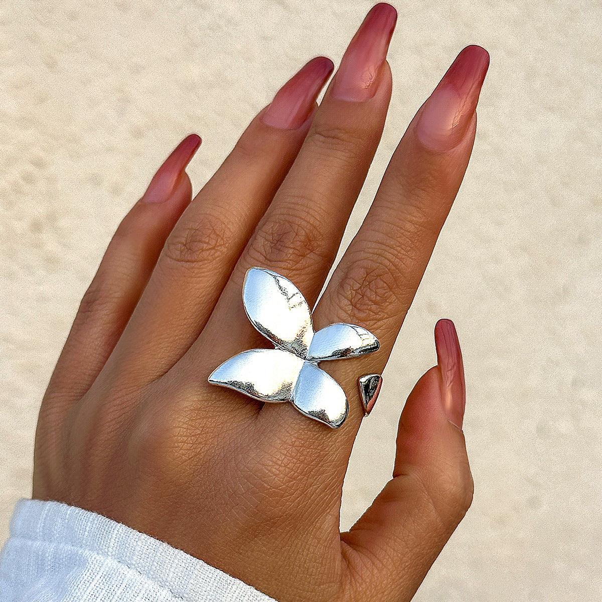 Metallic smooth butterfly ring for women, simple and exaggerated French bow ring