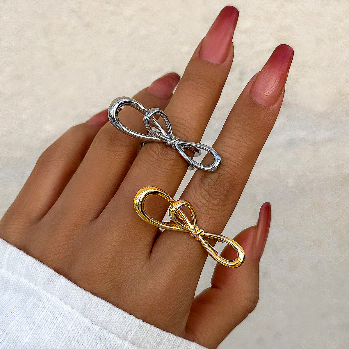 Metallic smooth butterfly ring for women, simple and exaggerated French bow ring